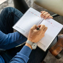 Montre homme Festina F20534/1 à cadran squelette, bracelet en maille d'acier inoxydable argenté, mouvement automatique, aiguilles bleues, design élégant à cœur ouvert Homme FESTINA