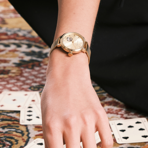 Montre femme Pierre Lannier Soline 139L542 automatique en acier milanais doré avec cadran doré texturé à cœur ouvert