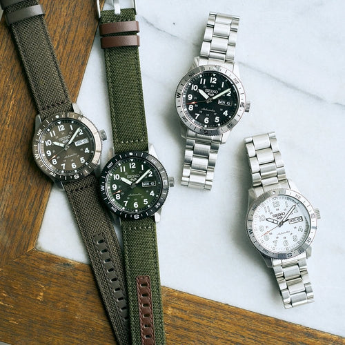 Seiko HDB008K1 Montre Homme Seiko 5 Sports Field Automatique - Cadran Vert, Bracelet Nylon et Cuir, Lunette Boussole, Étanche 100M, Style Aventure et Confort Quotidien